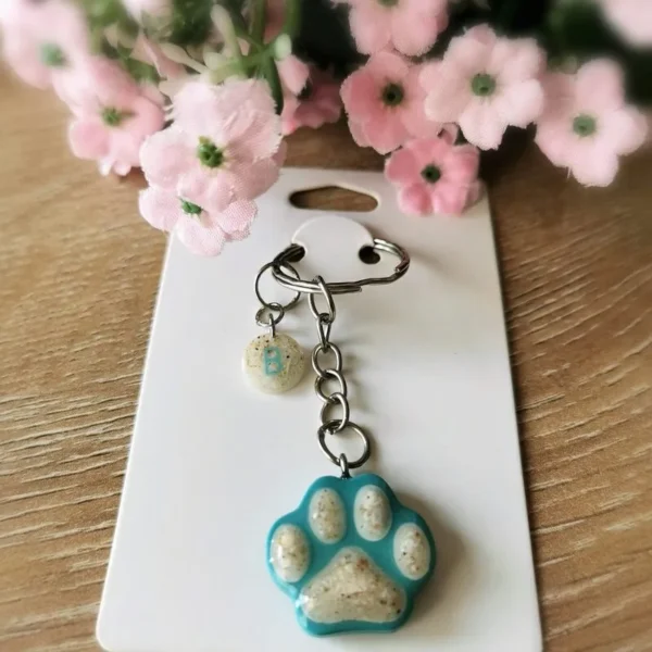 Dierenpootvormige as-sleutelhanger