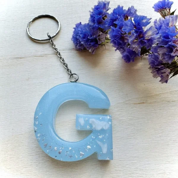 Lettersleutelhanger met tandjes