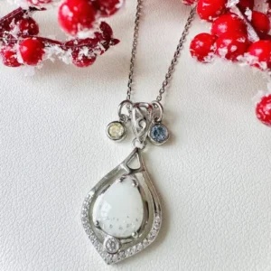 Moedermelk hanger met bladzilver en geboortesteentjes van November + Maart