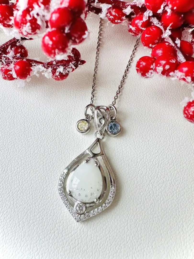 Moedermelk hanger met bladzilver en geboortesteentjes van November + Maart