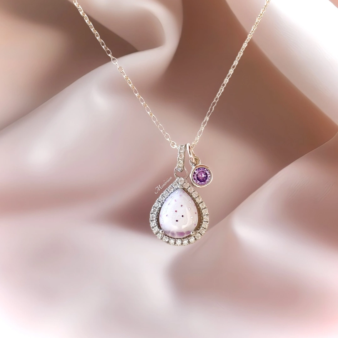 Druppel hanger met crushed birthstones en een geboortesteen bedel van Februari
